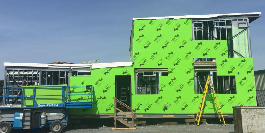 full-view-of-a-prebuilt-modular-structure-with-unfinished-walls full-view-of-a-prebuilt-modular-structure-with-unfinished-walls