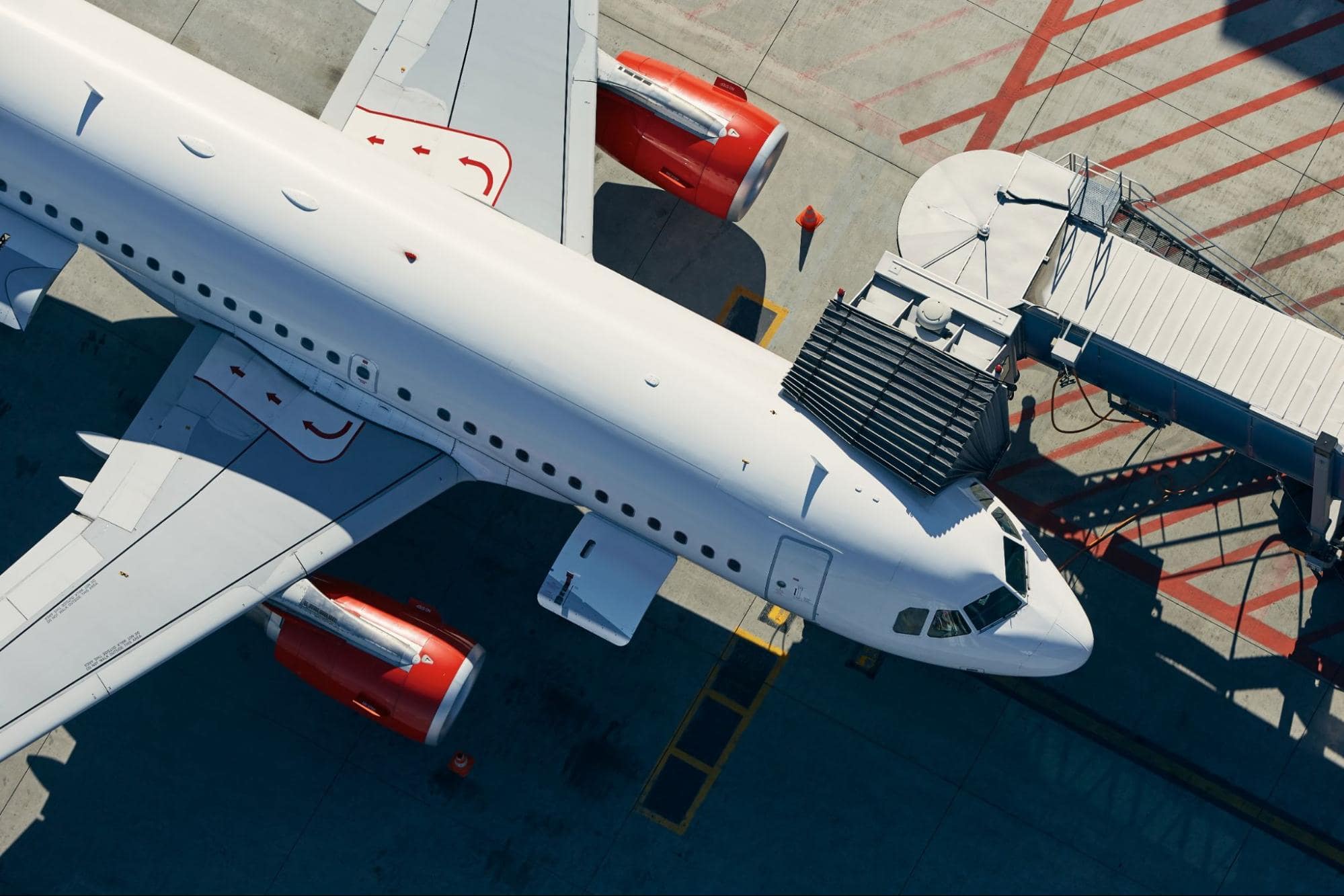 A-drone-photo-of-a-plane-on-a-runway A-drone-photo-of-a-plane-on-a-runway
